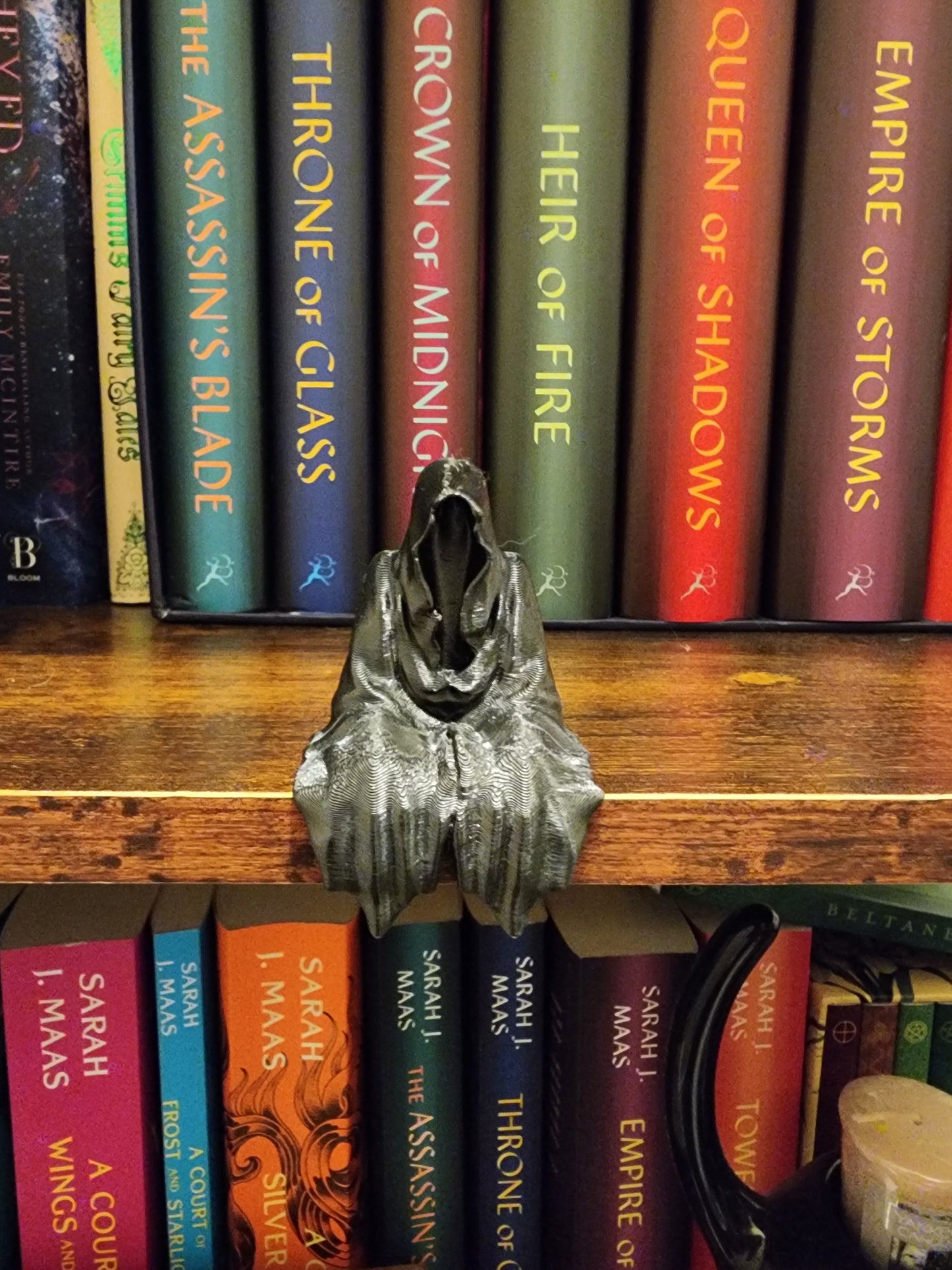 Small Suriel on a Shelf